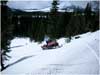 Here's Cindy on her 550 RMK on the back side of Ash Creek Loop.